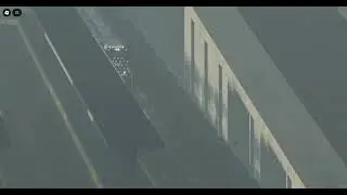 KCS 4006 (Honoring Our Veterans) leads a CPKC Grain train