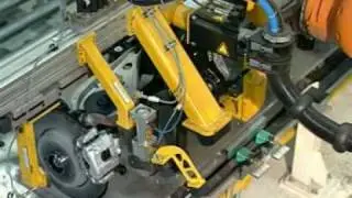Handling of front and rear axles and car doors with a KUKA robot