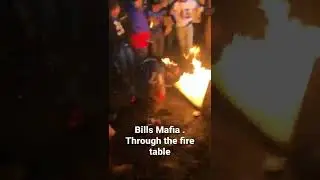 Bills Fan jumps through table on Fire