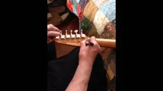 Ted Newman-Jones III Luthier signs prototype as the model of the new Newman Guitars.