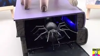 Wednesday Animatronic Thing on Stack of Books and Spider from Lowes Wednesday Collection
