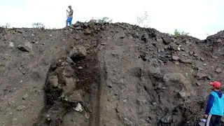 Dropping a Large Rock That Is on Top of a Cliff 