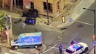 Police search for suspects in stolen car that crashed into ambulance, building