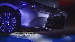 Car hits ambulance