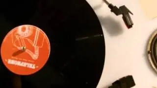 Four armed turntable with added cello and theremin