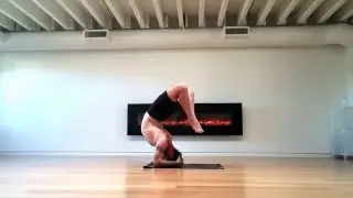 Jason does slow Headstand Tic Toc at Second Side Yoga