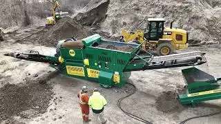 Revolver RT508 and 40' Radial Stacker screening topsoil for Oakland County, Michigan