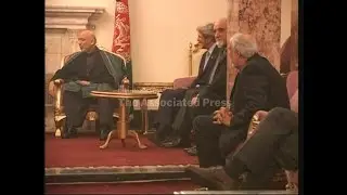 Photo op of Karzai with visiting US congress delegation inclg Kerry