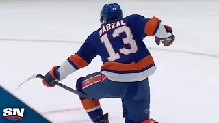Islanders' Matthew Barzal Wiggles His Way Through Traffic For Slick Backhand Goal