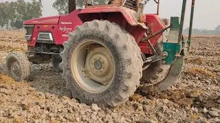 Mahindra Arjun on single tine subsoiler