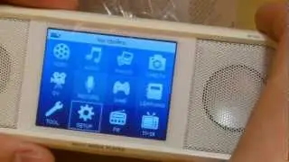 JXD M100 портативный медиа центр