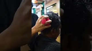A soothing wash, gentle massage, and a natural style that brings out his best look.