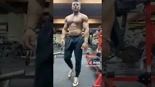 Shirtless guy flexing and posing