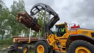 Volvo L200H Highlift working with timber on demo area at Volvo CE in Sweden.