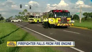 Firefighter hospitalized after falling off truck