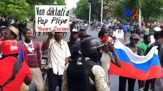 LEON CHARLES Krache sou Kadav on polisye. li di yo touye l nan v&ograve;l&egrave; pandan se bandi ki touye l, tris