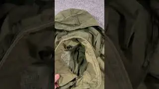 90s cold weather gear OG 107 field jacket with patches and hood.