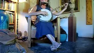 Chris Playing Banjo and Harp 7 15 12