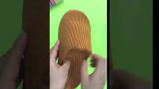 Cut out floor slippers from sweater sleeves
