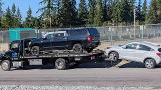 A Toyota Tundra and a Honda HRV towed to Safari