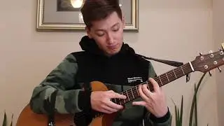 Alor Dance on guitar