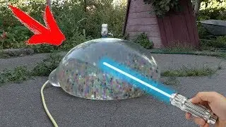 QUEMO CON LASER un GLOBO GIGANTE de AGUA con 15 KG de ORBEEZ