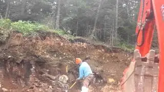 Canadian roads: splitting granite fieldstone #3
