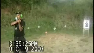 Tiro de espalda con revolver .22