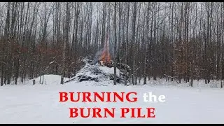 Burning a Huge Pile of Trees in the Woods in the Snow - Big Burn Pile