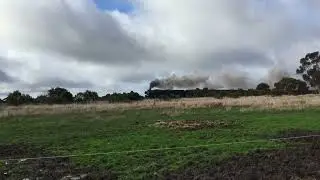Old Steam Train Running Through The Farm