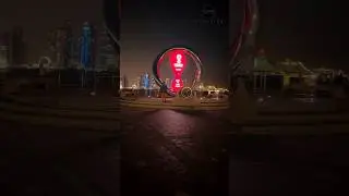 outside under the red street light the World Cup in Qatar . #outdoor #standing #red #streetlight