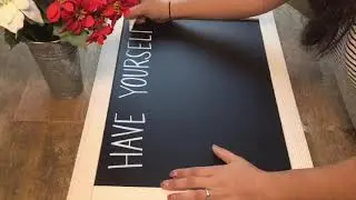 Hand lettering a Christmas Chalkboard Sign