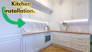 Kitchen assembly. White beautiful fronts + gold handles.