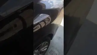 Paintless Dent Repair on a Black Chrysler 200