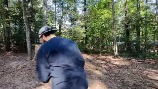 Matt and Ivy take on hole 12 at Burke Lake Disc Golf Course