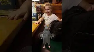 There's a RAT sitting next to Isabella! 🐀 😲
