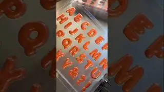 Create custom chocolate letters with our Alphabet Mould! Spell sweet messages. #chocolate #mould