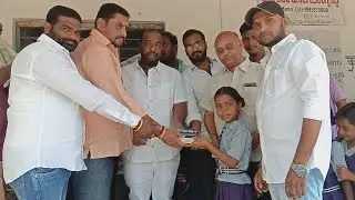 Books Distribution by P Dharma Reddy 'President Rajendra Nager Division & Prashant Ana At Upperpally