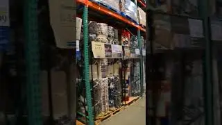 Looking at Rugs at Costco