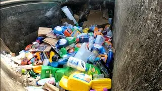 Waste Management garbage truck packing recycle