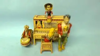 VINTAGE UNIQUE ART LIL ABNER & HIS DOGPATCH BAND TIN WIND UP TOY