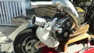 MB (rear/downward facing) CR 470 with TS 460 head shell, ??? porting,1 mill crank, JetPro pipe HDA48