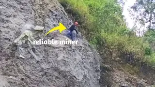 The two skilled miners collaborated when looking for sand on the cliff