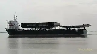 Heavy load carrier PAPENBURG passes Emden with cruiseliner sections for Meyer Werft