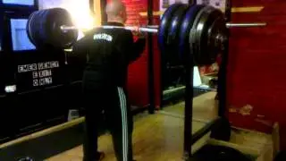 Justin Thacker back squat (I think) around 250kg at The Old Lab Gym in 2010