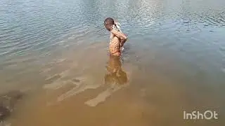 African boy taking bath in the river @iammarwa