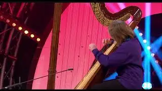 Elin playing her Aoyama Orpheus 47 from Cambrian Harps at the 2025 Urdd Eisteddfod