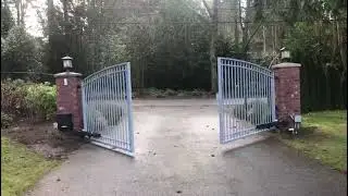 Automated Driveway Gate with Brick Pillars  AD Construction Residential Access Project