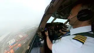 BOEING 747  LANDING.  ILS approach in clouds. Runway insight at 300 feet over the ground. Captain PF