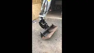 Harford Attachments Ltd - Uni-Lok® Hydraulic Tilting Hitch on Takeuchi Excavator